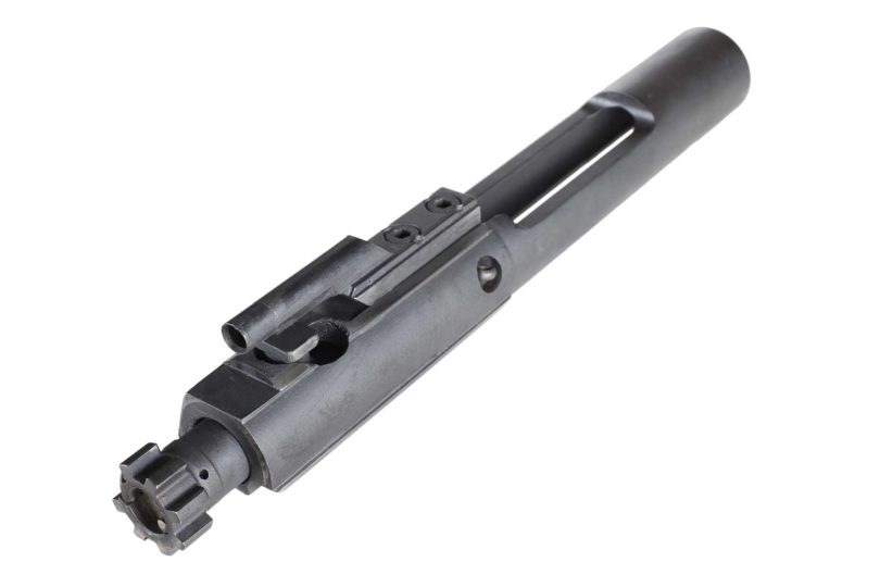 A bolt carrier group component shown at an angle on a white background